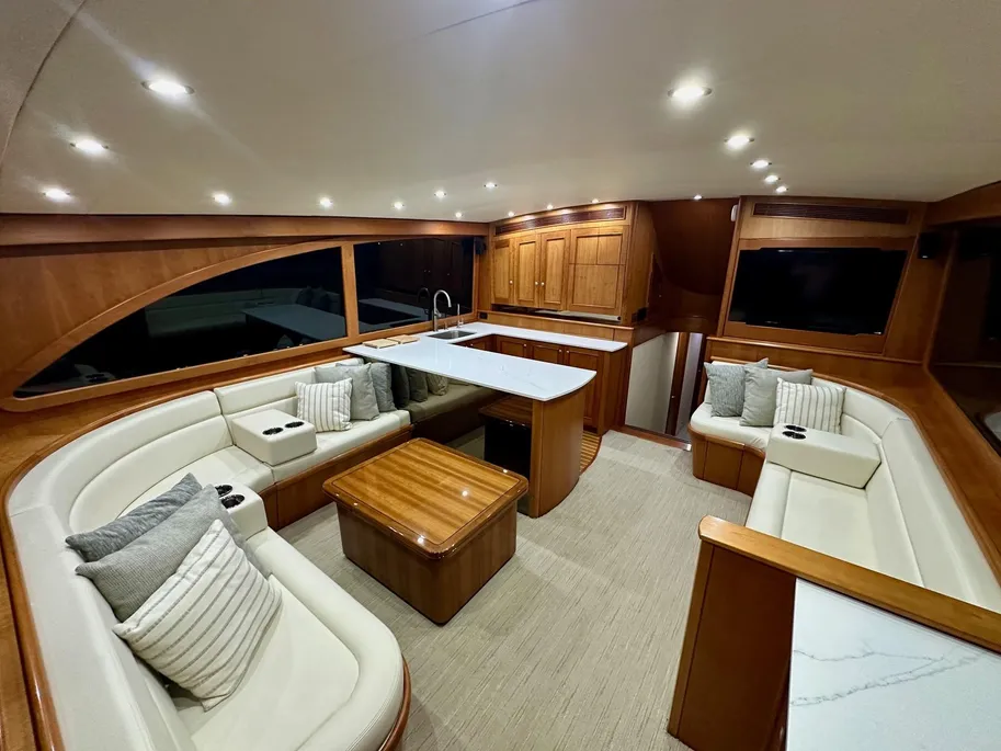 2009-custom-carolina-58-convertible-power-9471466-20240717123819424-1_XLARGE Lounge room on the vessel